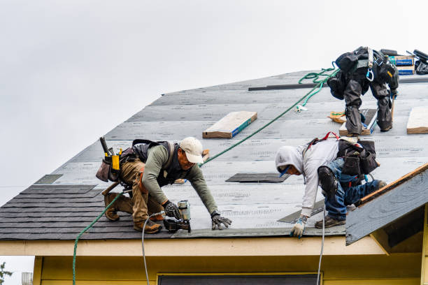 Professional Roofing technician working in Hinton, OK